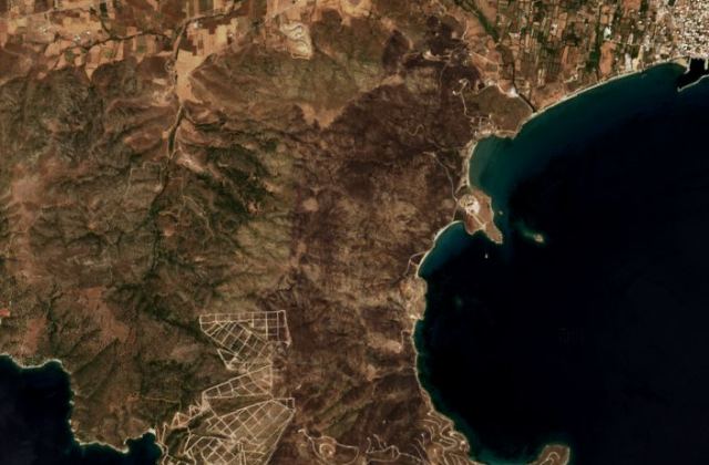 Burned area near Kárystos from space